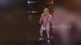 Man filmed shopping in UK wearing nothing but a red mankini