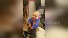 Adorable baby smiles as he hears his mum's voice for the first time