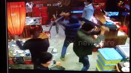 Masked thugs smash up restaurant with machetes over poor service