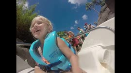 Little Girl Loves the Water Slide!