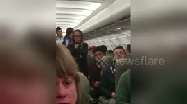 Newsflare Edit - Video of teenager being removed from airplane upon landing