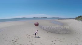 Football Hits a Drone Midair