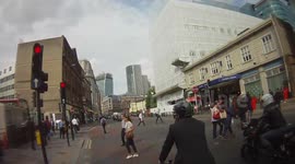 Motorcyclist pulls wheelie in City of London