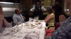 Cruise Ship Waiter Entertains Passengers