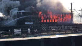 Massive blaze at Newark warehouse near train tracks