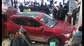 Car mows down clothes shop worker