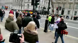 Angry Brexiteers steal cyclist's EU flag at demo