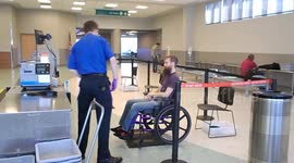 Wheelchair and TSA security in airport for flying