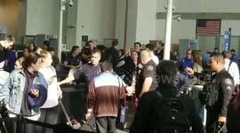 man tries to run pass tsa checkpoint lax airport police at work at Los Angeles International Airport