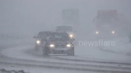 Traffic battles with heavy snow on Glenshane Pass, Northern Ireland