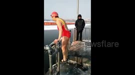 Impressively fit 85-year-old takes dip in frozen lake