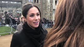 Meghan Markle chats with fellow American at Cardiff Castle