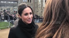 Meghan Markle and Prince Harry chatting with crowds at Cardiff Castle
