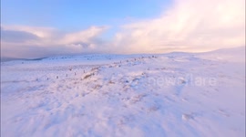 Drone Flies Low Over Beautiful Mountain Snow