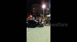 Scene from the beach after car hit Copacabana pedestrians