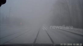 Driving Into A Snow Storm