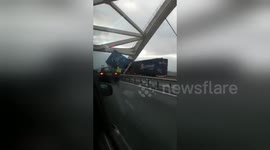 Truck blown over by extreme crosswinds in The Netherlands