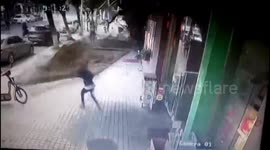 Unlucky pedestrian flattened by huge shop sign