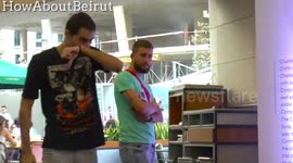 Pranksters startle unsuspecting passers-by with sneeze gag