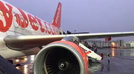 Queue to board busy easyJet flight