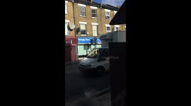 London pedestrian 'fights' with traffic light in broad daylight