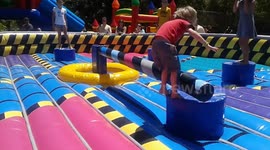Child repeatedly falls off playground attraction
