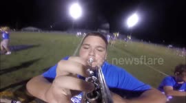Hilarious marching band fail as high-school student trips up