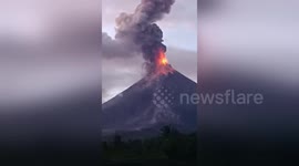 Philippine volcano spews lava