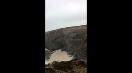 Python found on cliffs in Portreath, Cornwall. Contains swearing. Completely unstaged.  Just a few guys going for a clifftop walk recording their walk.
