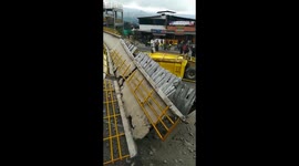 Truck destroys pedestrian bridge on highway near Bogota