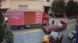 Man gets up with only scratches after lorry reverses over him