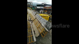 Truck destroys pedestrian bridge on highway near Bogota
