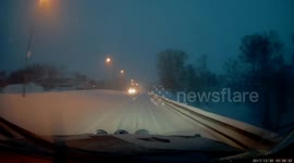 Car Blocking the main road to remove snow
