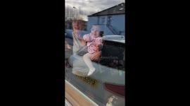 Daughter meeting baby sister for the first time