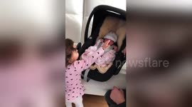 Little girl's ecstatic reaction to meeting newborn sister for first time