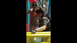 Woman with cerebral palsy tacked zip line at Urban Air park