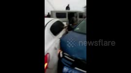 Hundred of vehicles pile-up on icy bridge