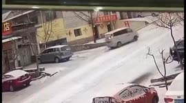In like a glove - driver spins on icy road but parks perfectly