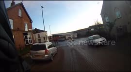 Clueless UK driver runs into cyclist