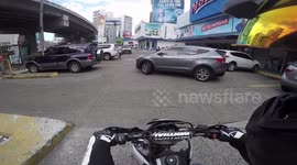 Man carelessly talking on mobile phone gets angry against motorcyclist