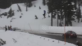 Ian jumps over Cousin Randy's suburban and lands on a tree