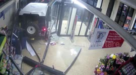 Balaclava-clad ram-raiders use stolen Land Rover to smash their way into an Aldi and make off with a cash machine