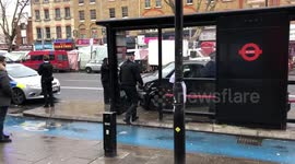 Car crashes into bus stop in East London's Whitechapel