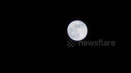 Blue supermoon over the Scottish highlands