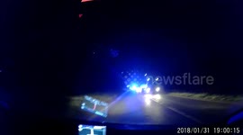 Police car in near head on collision with lorry