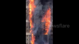 Huge fire breaks out in 20-storey office building