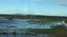 Flooded roads in county Kerry Ireland after heavy down pours of rain with high tides