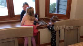Kids laughing at a song.