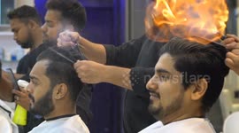 Indian barber cuts men’s hair … by setting it on FIRE