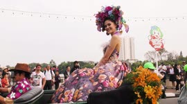 Beauty queens in classic cars drive through Chiang Mai, Thailand